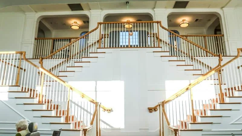 Renovated staircase and reception interior at Atria Merrimack